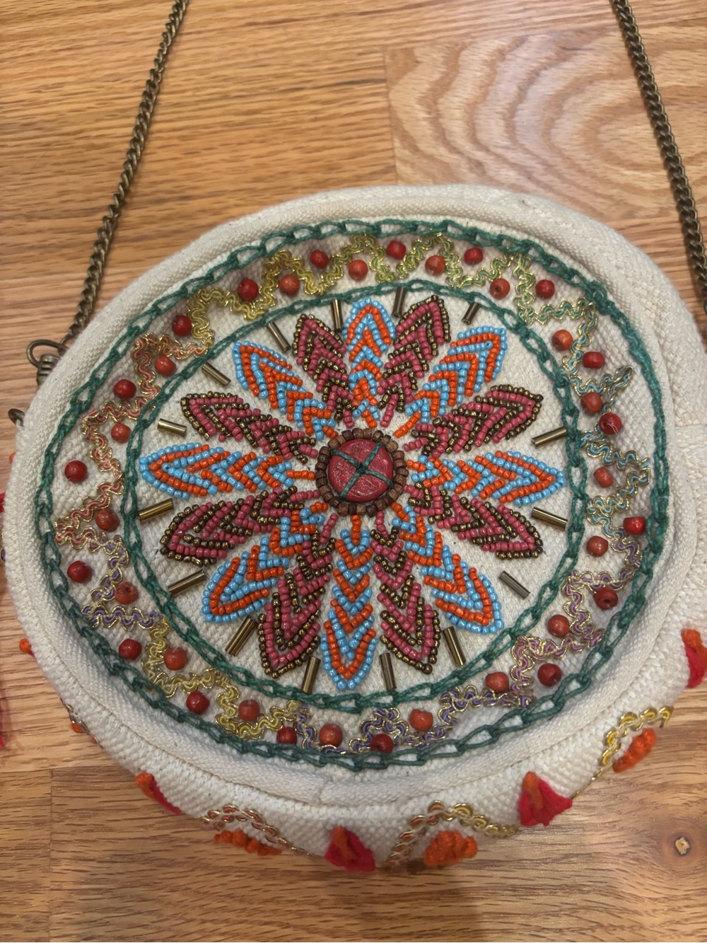 Embroidered Round Crossbody Bag in White with Pink Tassel - Picture 2 of 4